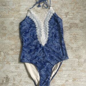 Anthropologie swimsuit in a blue fish pattern. Size medium.